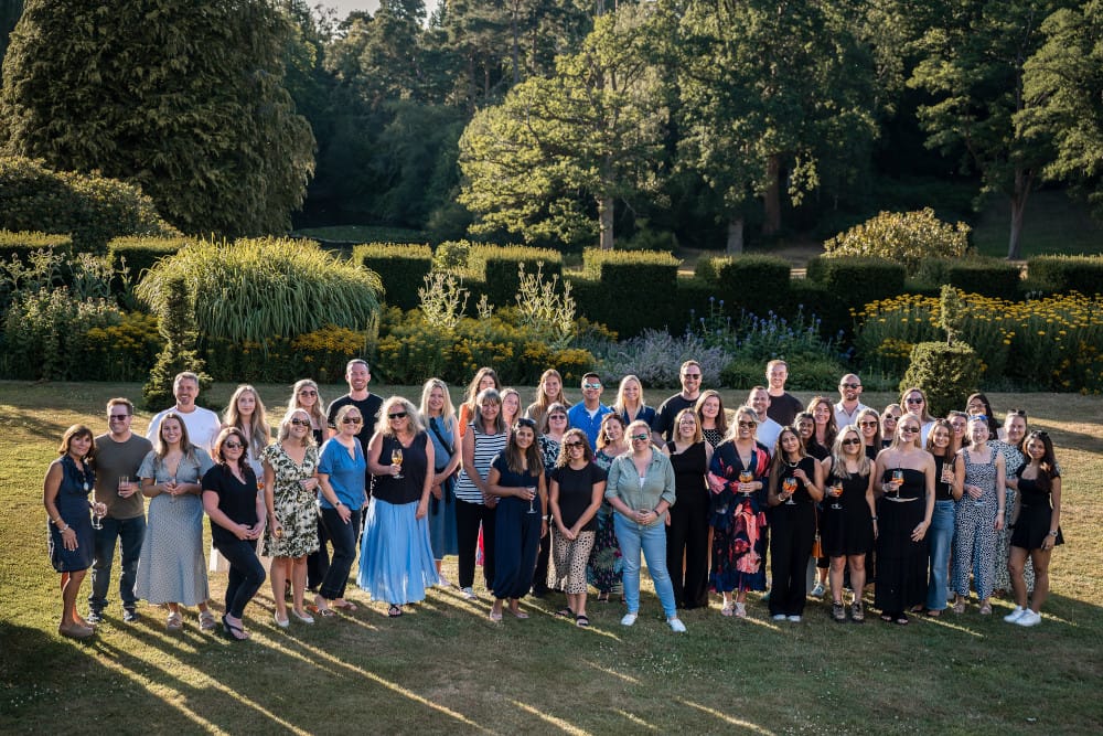 Photograph of Resonant Group outside at the company meeting.